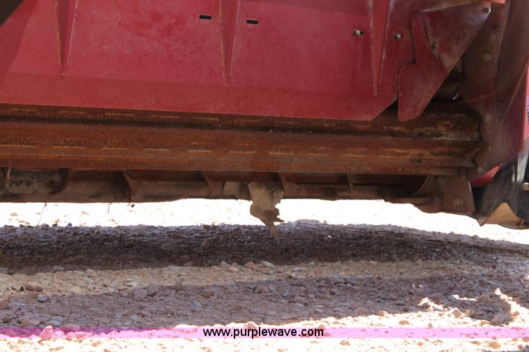 image for item H1559 2012 MacDon M205 self-propelled windrower