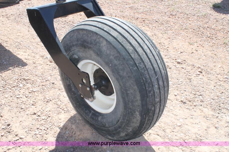 image for item H1559 2012 MacDon M205 self-propelled windrower