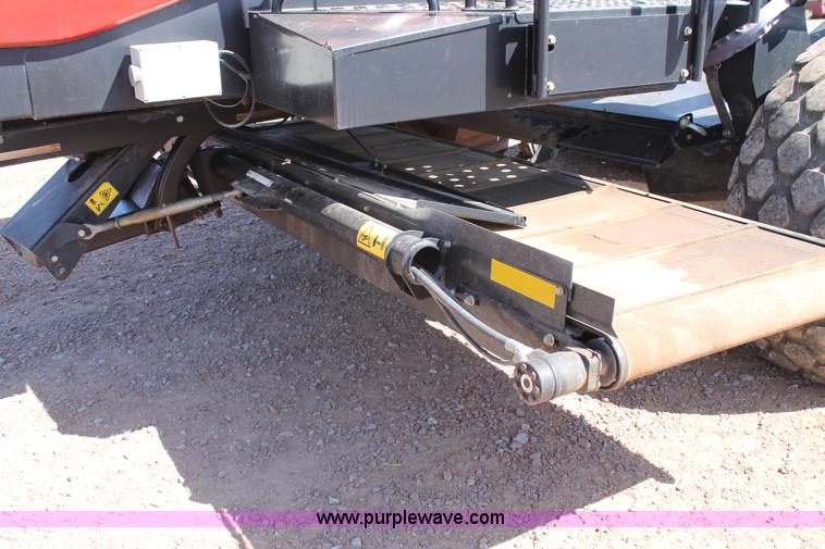 image for item H1559 2012 MacDon M205 self-propelled windrower