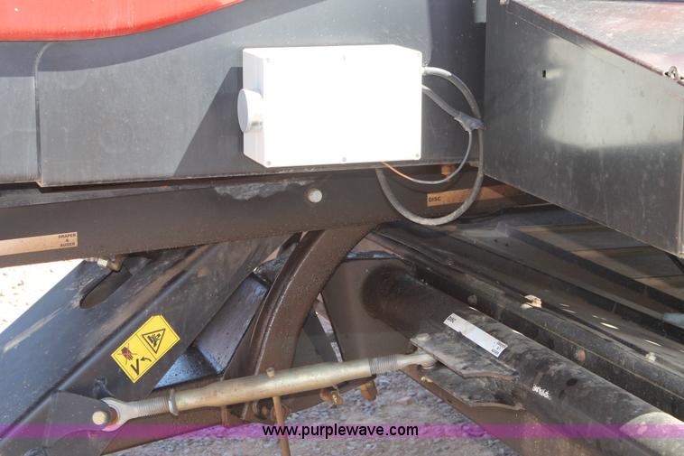 image for item H1559 2012 MacDon M205 self-propelled windrower