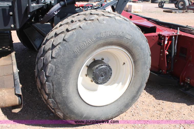 image for item H1559 2012 MacDon M205 self-propelled windrower