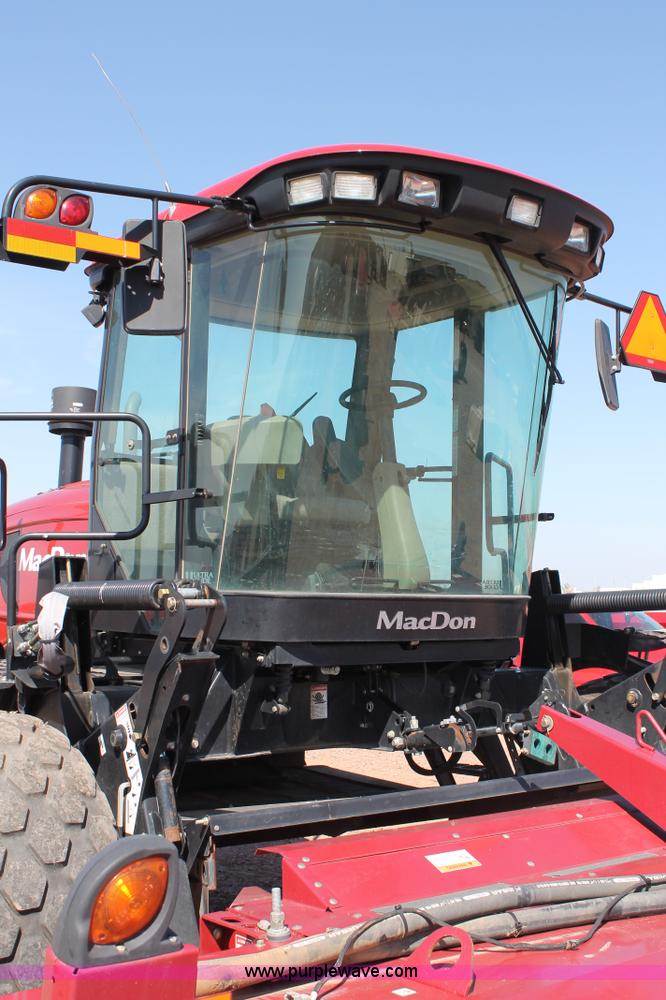 image for item H1559 2012 MacDon M205 self-propelled windrower