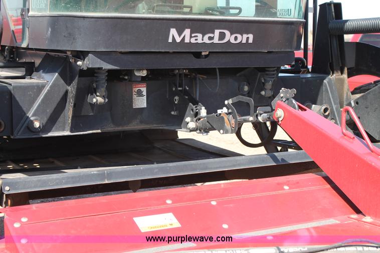 image for item H1559 2012 MacDon M205 self-propelled windrower