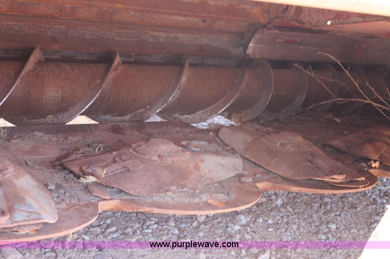 image for item H1559 2012 MacDon M205 self-propelled windrower