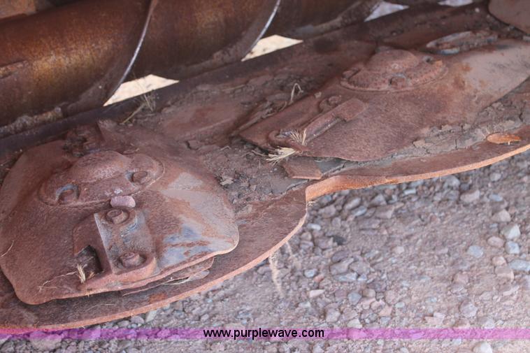 image for item H1559 2012 MacDon M205 self-propelled windrower