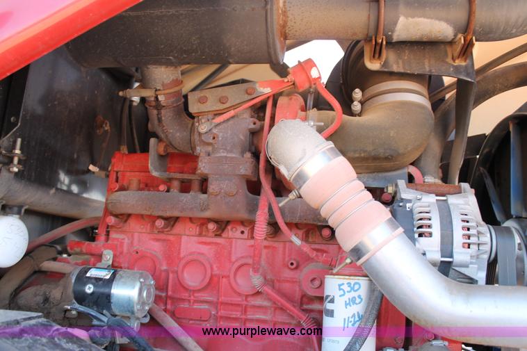 image for item H1559 2012 MacDon M205 self-propelled windrower