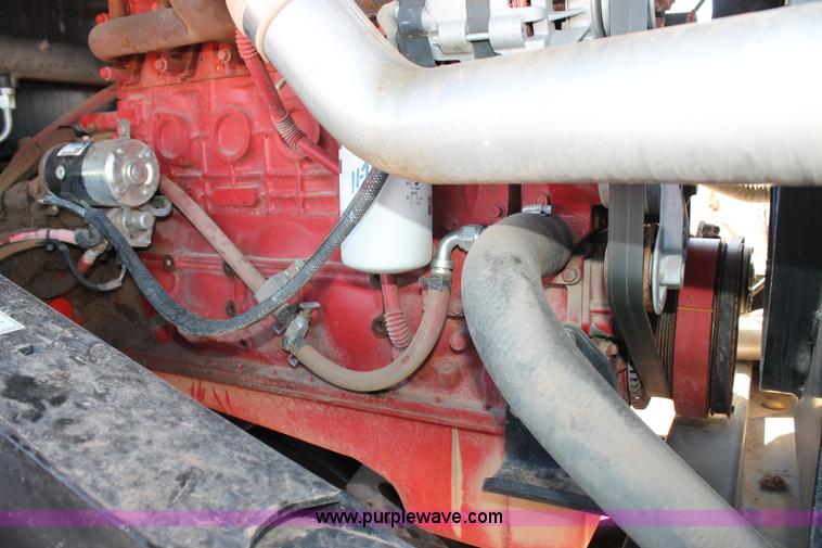 image for item H1559 2012 MacDon M205 self-propelled windrower