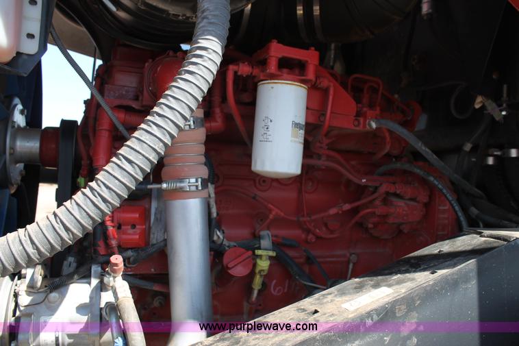 image for item H1559 2012 MacDon M205 self-propelled windrower