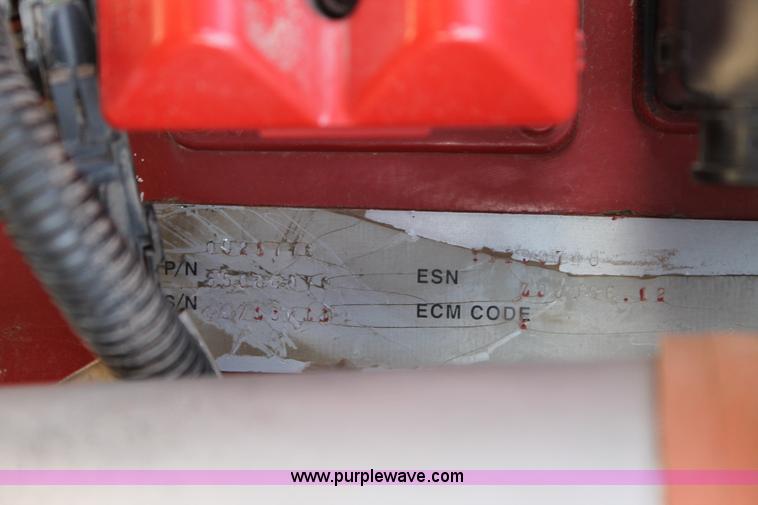 image for item H1559 2012 MacDon M205 self-propelled windrower