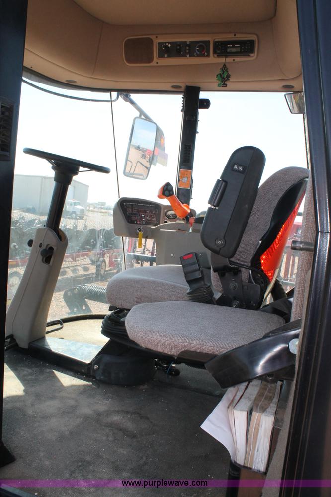 image for item H1559 2012 MacDon M205 self-propelled windrower