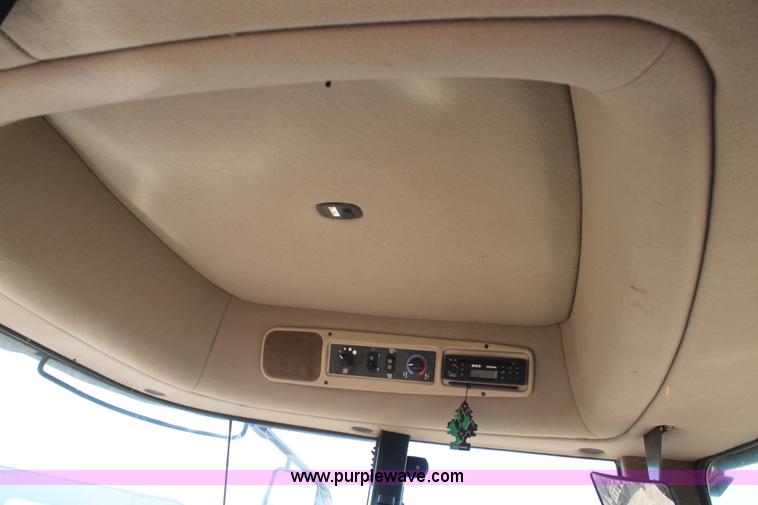 image for item H1559 2012 MacDon M205 self-propelled windrower