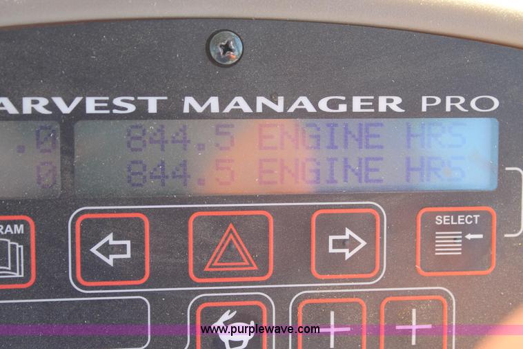 image for item H1559 2012 MacDon M205 self-propelled windrower