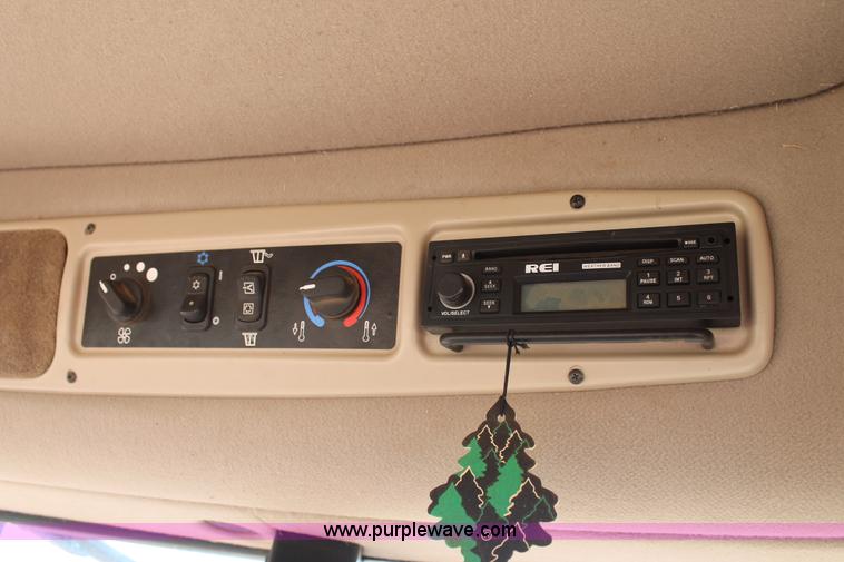 image for item H1559 2012 MacDon M205 self-propelled windrower