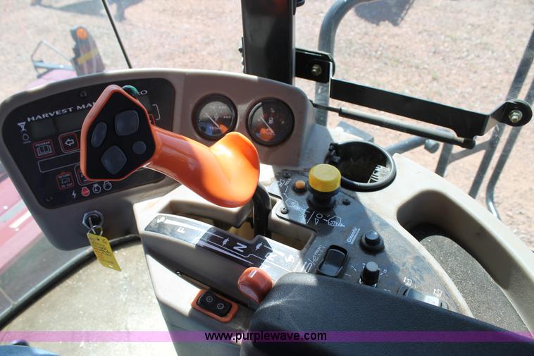 image for item H1559 2012 MacDon M205 self-propelled windrower