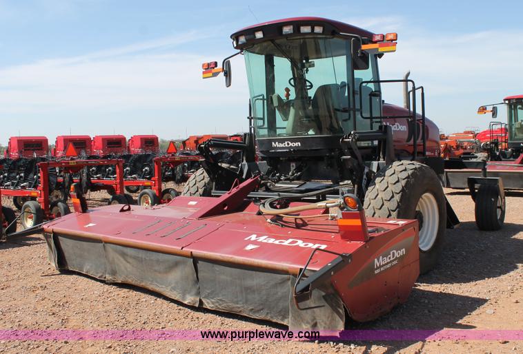 image for item H1560 2011 MacDon M205 self-propelled windrower