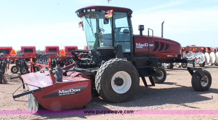 image for item H1560 2011 MacDon M205 self-propelled windrower