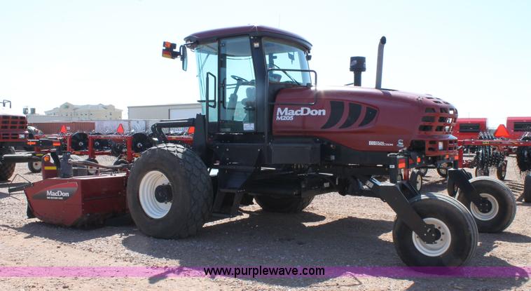 image for item H1560 2011 MacDon M205 self-propelled windrower