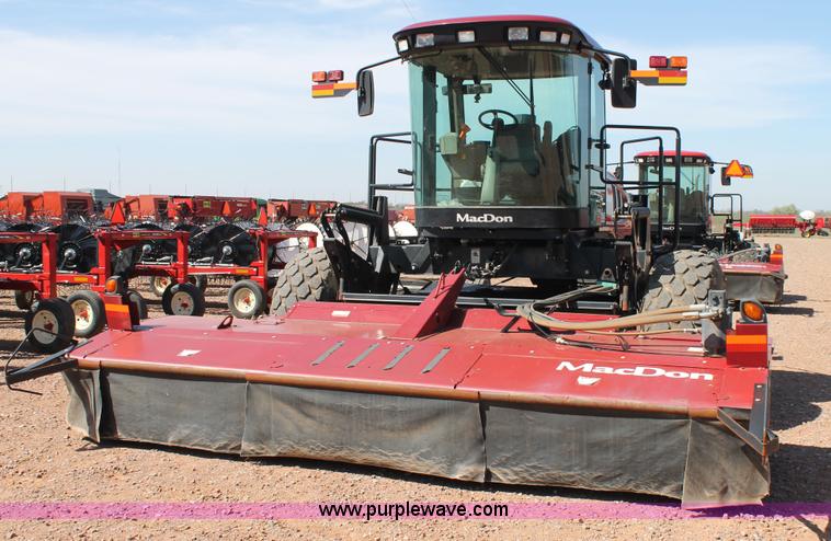 image for item H1560 2011 MacDon M205 self-propelled windrower