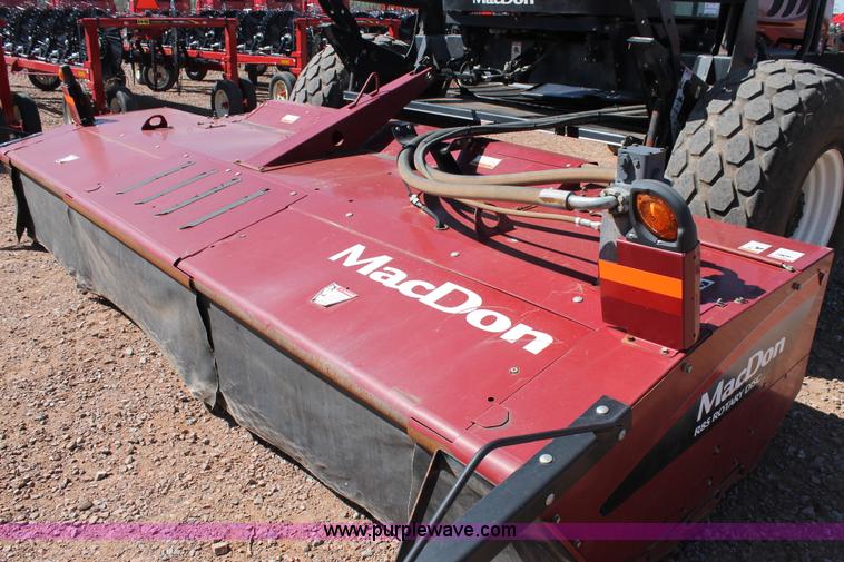 image for item H1560 2011 MacDon M205 self-propelled windrower