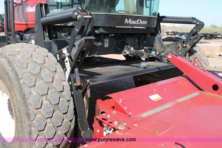 image for item H1560 2011 MacDon M205 self-propelled windrower