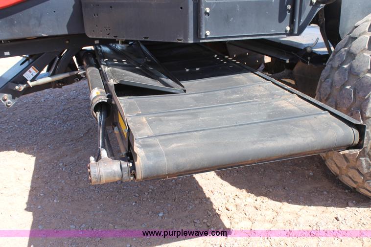 image for item H1560 2011 MacDon M205 self-propelled windrower