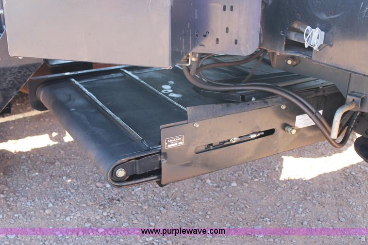 image for item H1560 2011 MacDon M205 self-propelled windrower