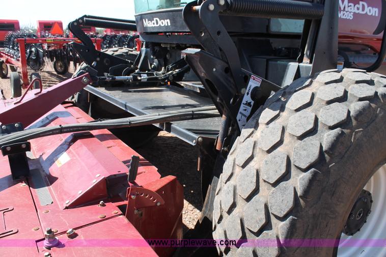 image for item H1560 2011 MacDon M205 self-propelled windrower
