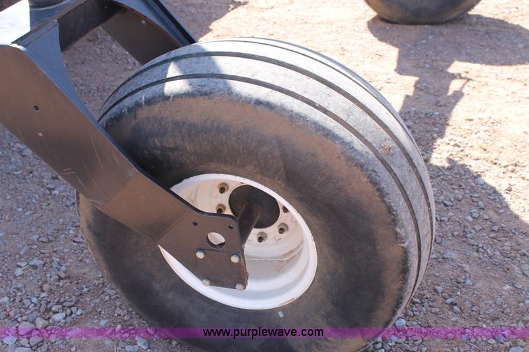 image for item H1560 2011 MacDon M205 self-propelled windrower