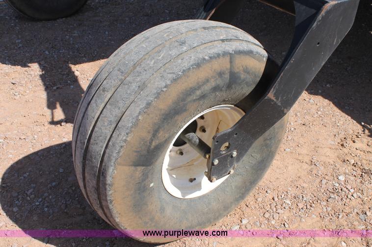 image for item H1560 2011 MacDon M205 self-propelled windrower