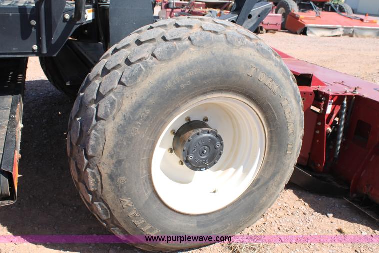 image for item H1560 2011 MacDon M205 self-propelled windrower