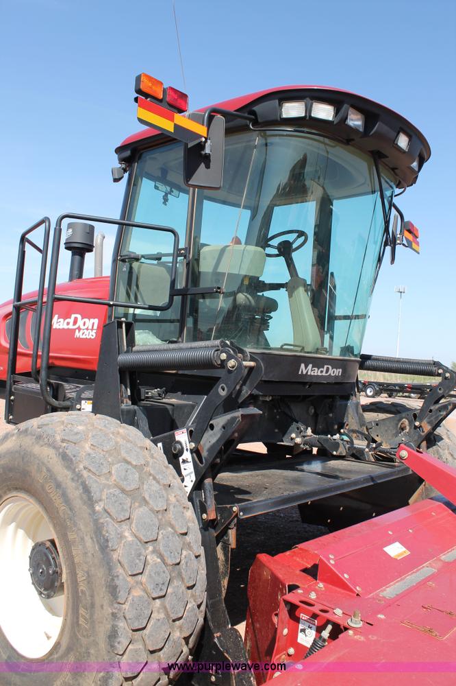 image for item H1560 2011 MacDon M205 self-propelled windrower