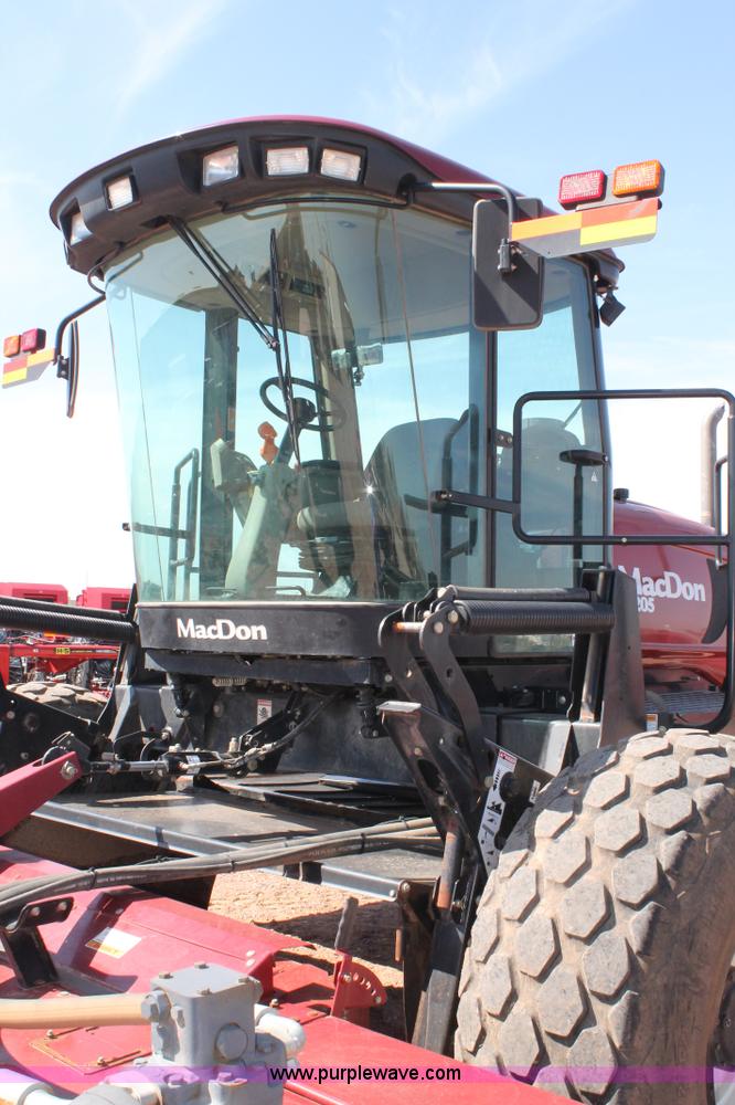 image for item H1560 2011 MacDon M205 self-propelled windrower