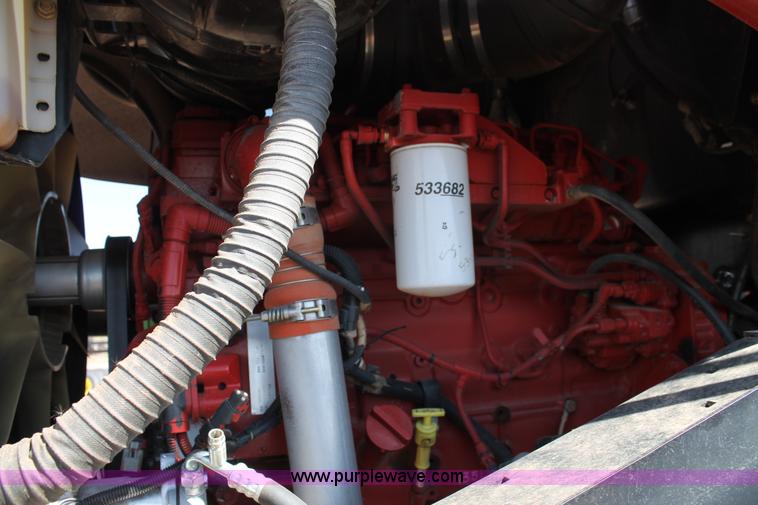 image for item H1560 2011 MacDon M205 self-propelled windrower