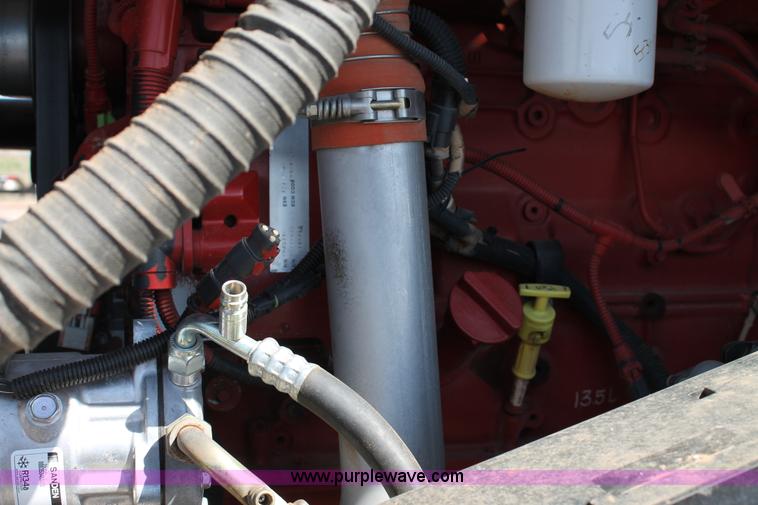 image for item H1560 2011 MacDon M205 self-propelled windrower