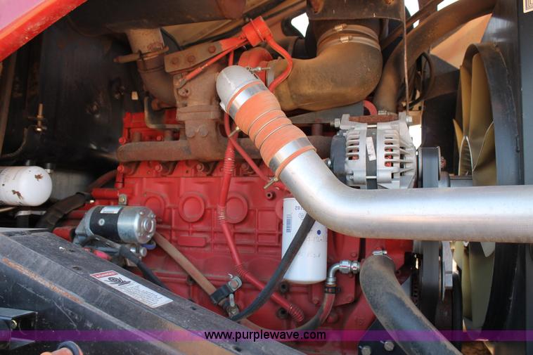 image for item H1560 2011 MacDon M205 self-propelled windrower