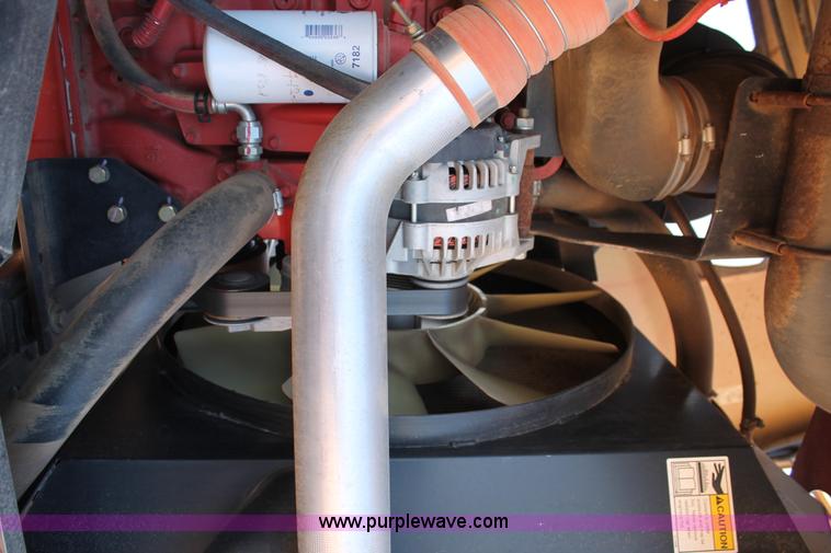 image for item H1560 2011 MacDon M205 self-propelled windrower