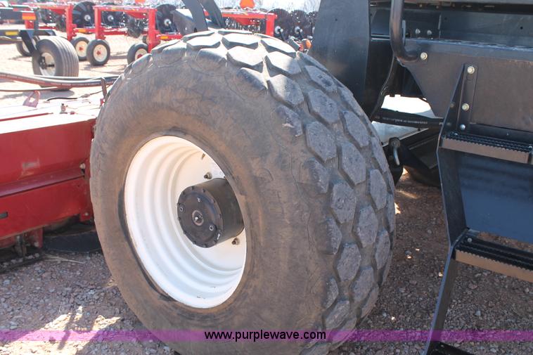 image for item H1560 2011 MacDon M205 self-propelled windrower