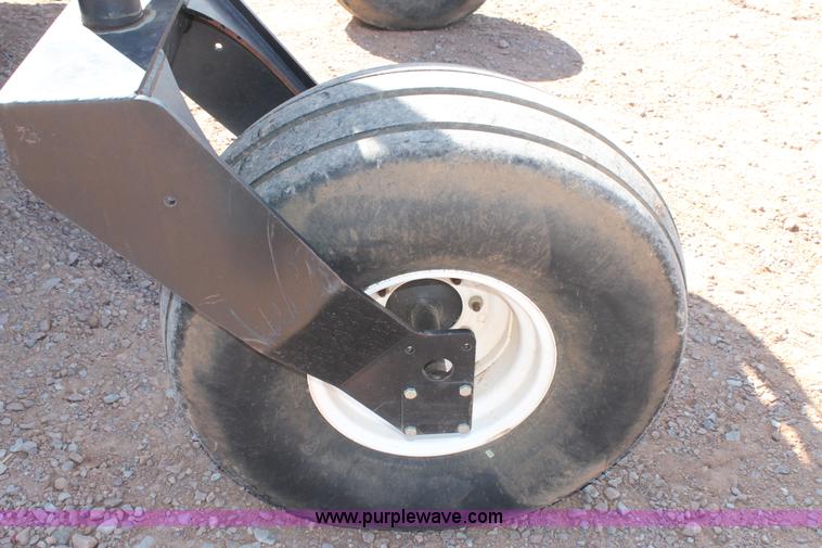 image for item H1560 2011 MacDon M205 self-propelled windrower