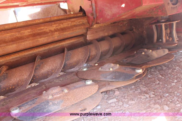 image for item H1560 2011 MacDon M205 self-propelled windrower