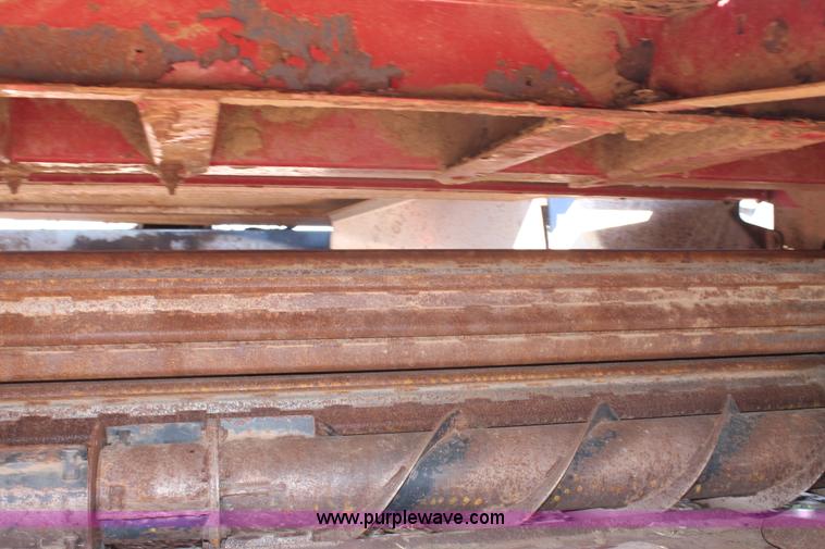 image for item H1560 2011 MacDon M205 self-propelled windrower