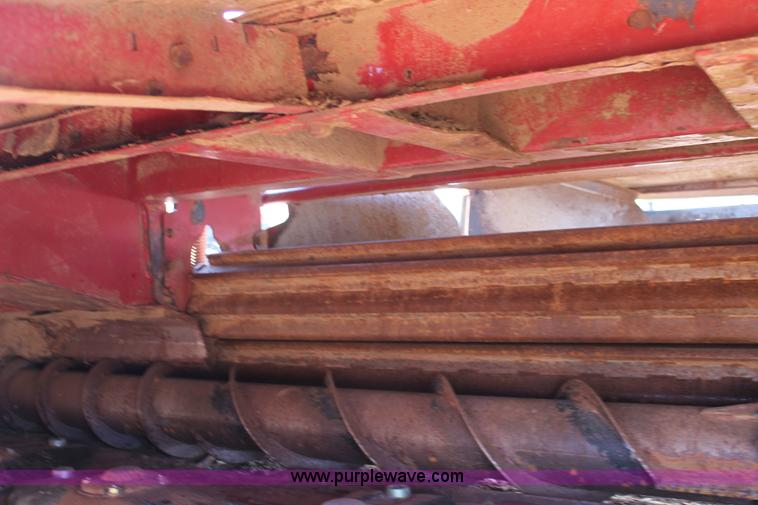 image for item H1560 2011 MacDon M205 self-propelled windrower