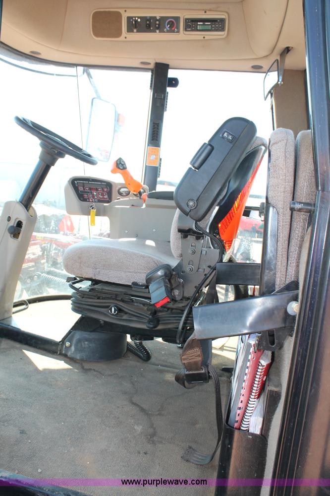 image for item H1560 2011 MacDon M205 self-propelled windrower