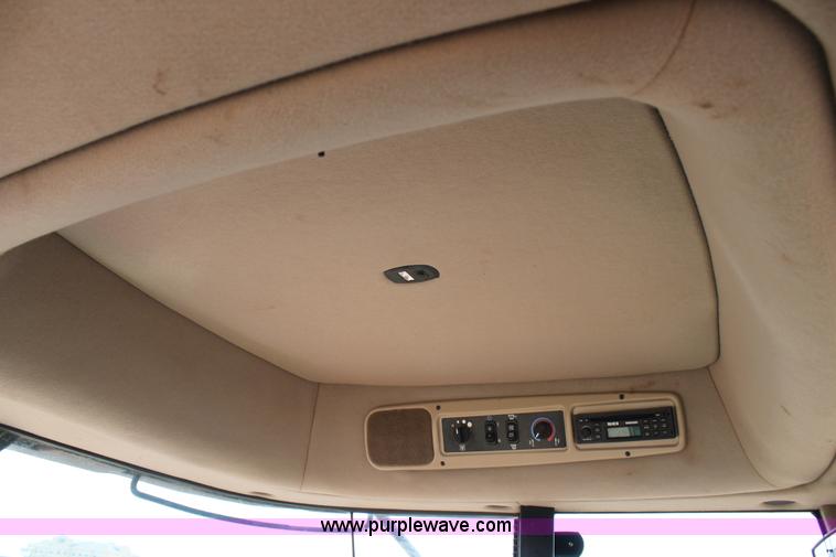 image for item H1560 2011 MacDon M205 self-propelled windrower