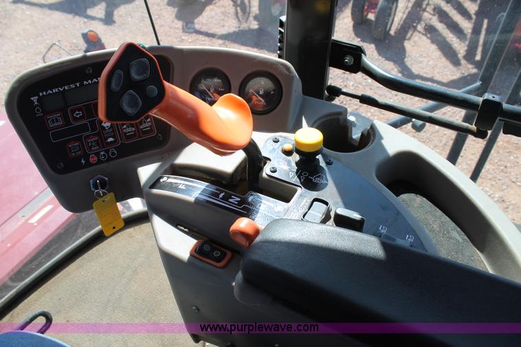 image for item H1560 2011 MacDon M205 self-propelled windrower