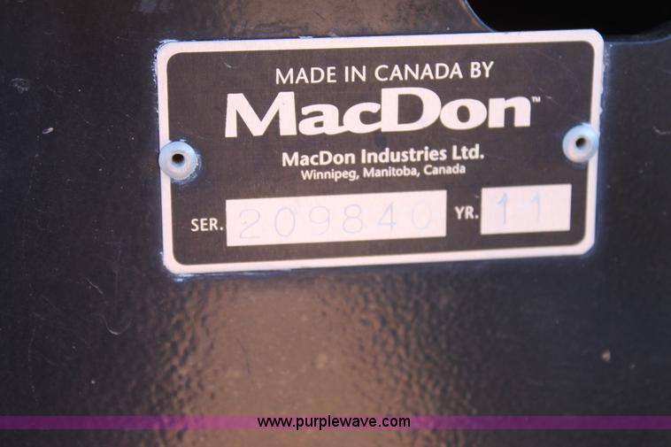 image for item H1560 2011 MacDon M205 self-propelled windrower