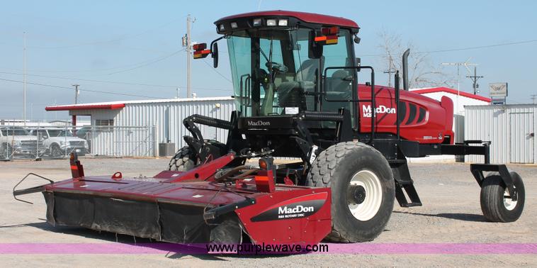 image for item H5859 2011 MacDon M205 self-propelled windrower