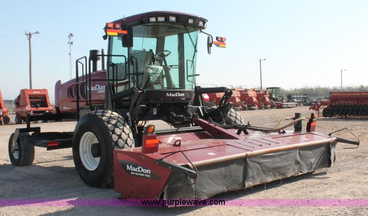 image for item H5859 2011 MacDon M205 self-propelled windrower