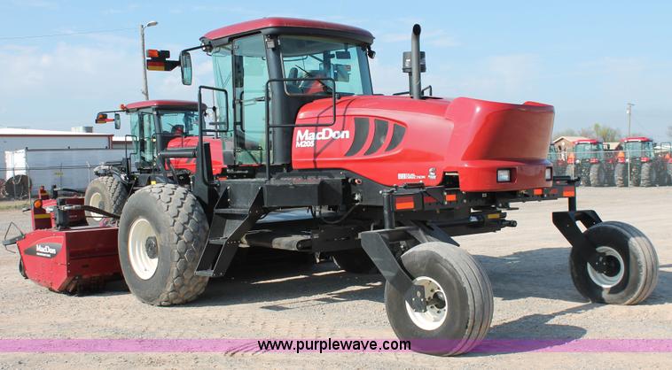 image for item H5859 2011 MacDon M205 self-propelled windrower