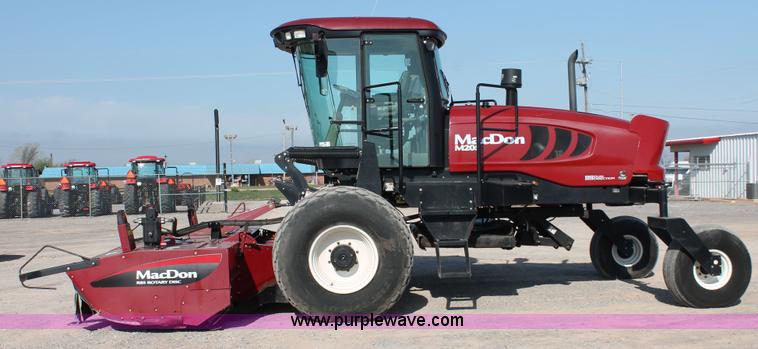 image for item H5859 2011 MacDon M205 self-propelled windrower