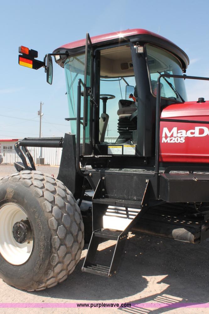 image for item H5859 2011 MacDon M205 self-propelled windrower
